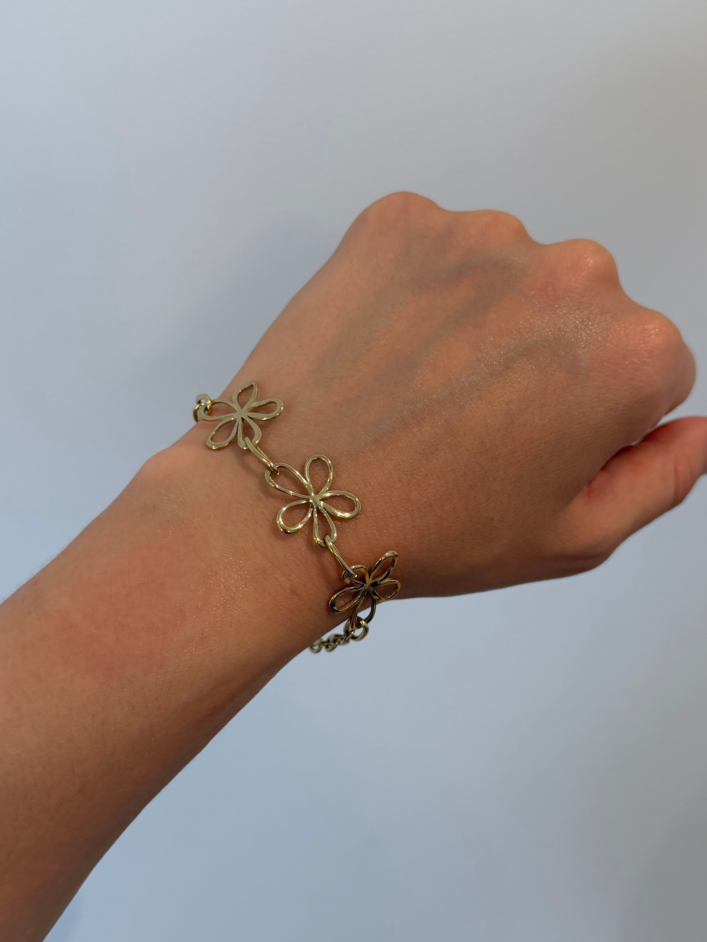 Pulseira flores douradas