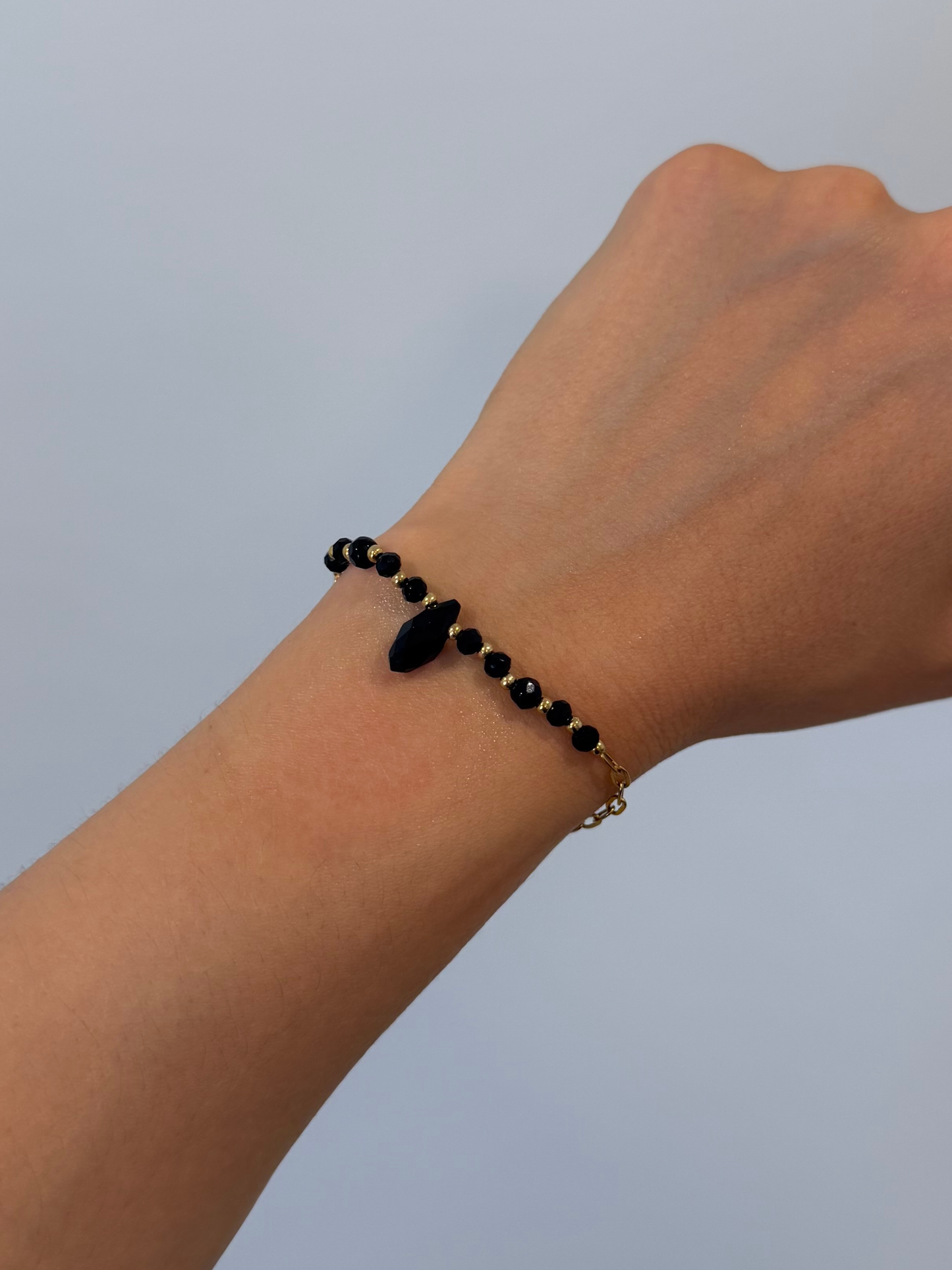 Pulseira preta ajustável