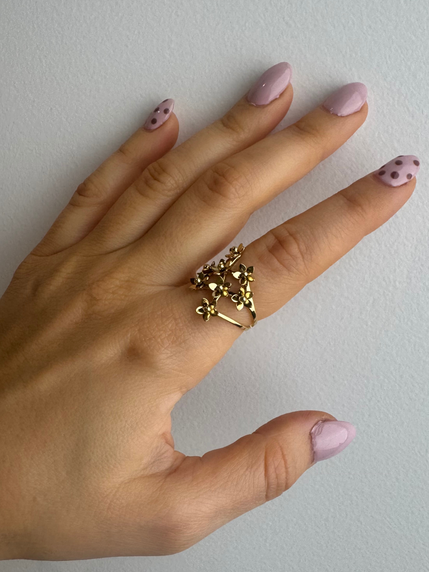 Anel flores douradas