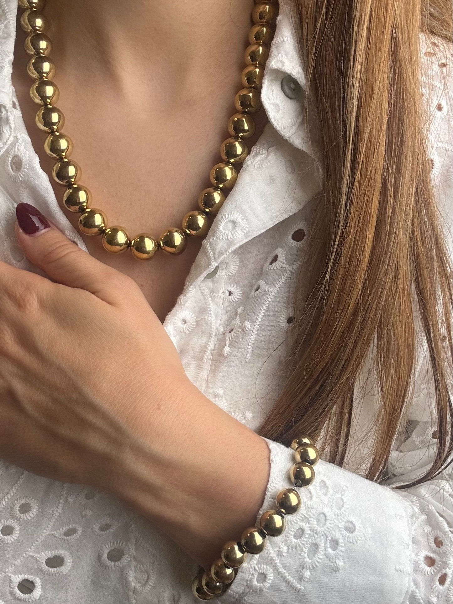 Colar bolas douradas