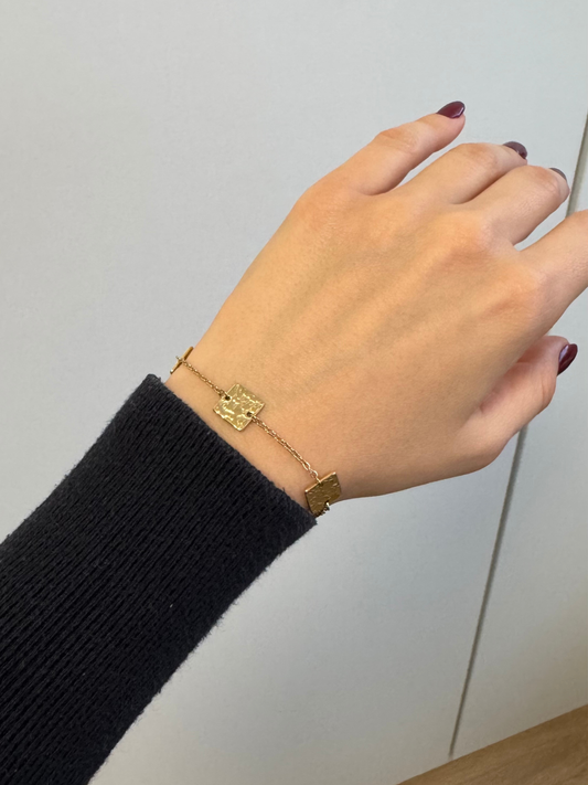 Pulseira quadrados dourados em aço inoxidável