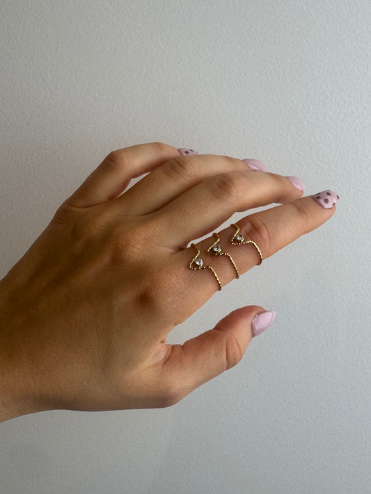 Anel dourado ajustável com 3 zircónias