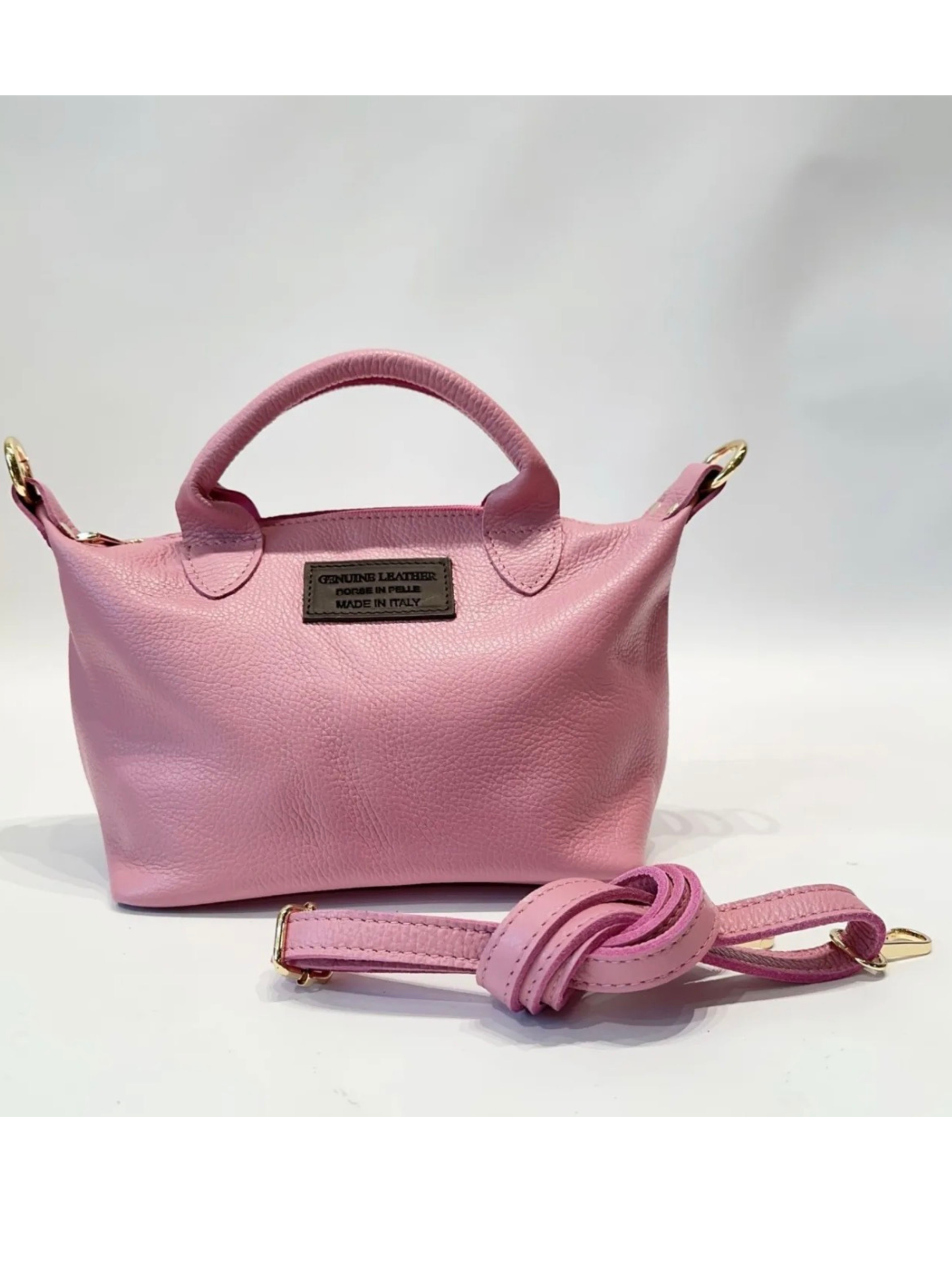Mala rosa em pele 30% de desconto