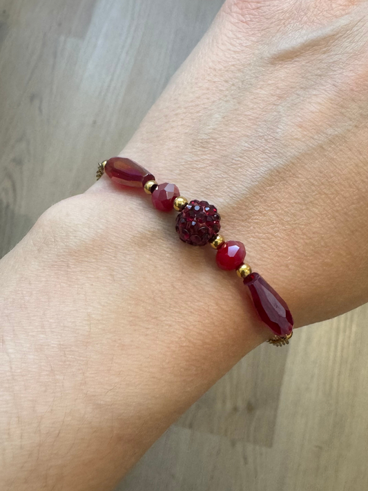 Pulseira vermelha em aço inoxidável