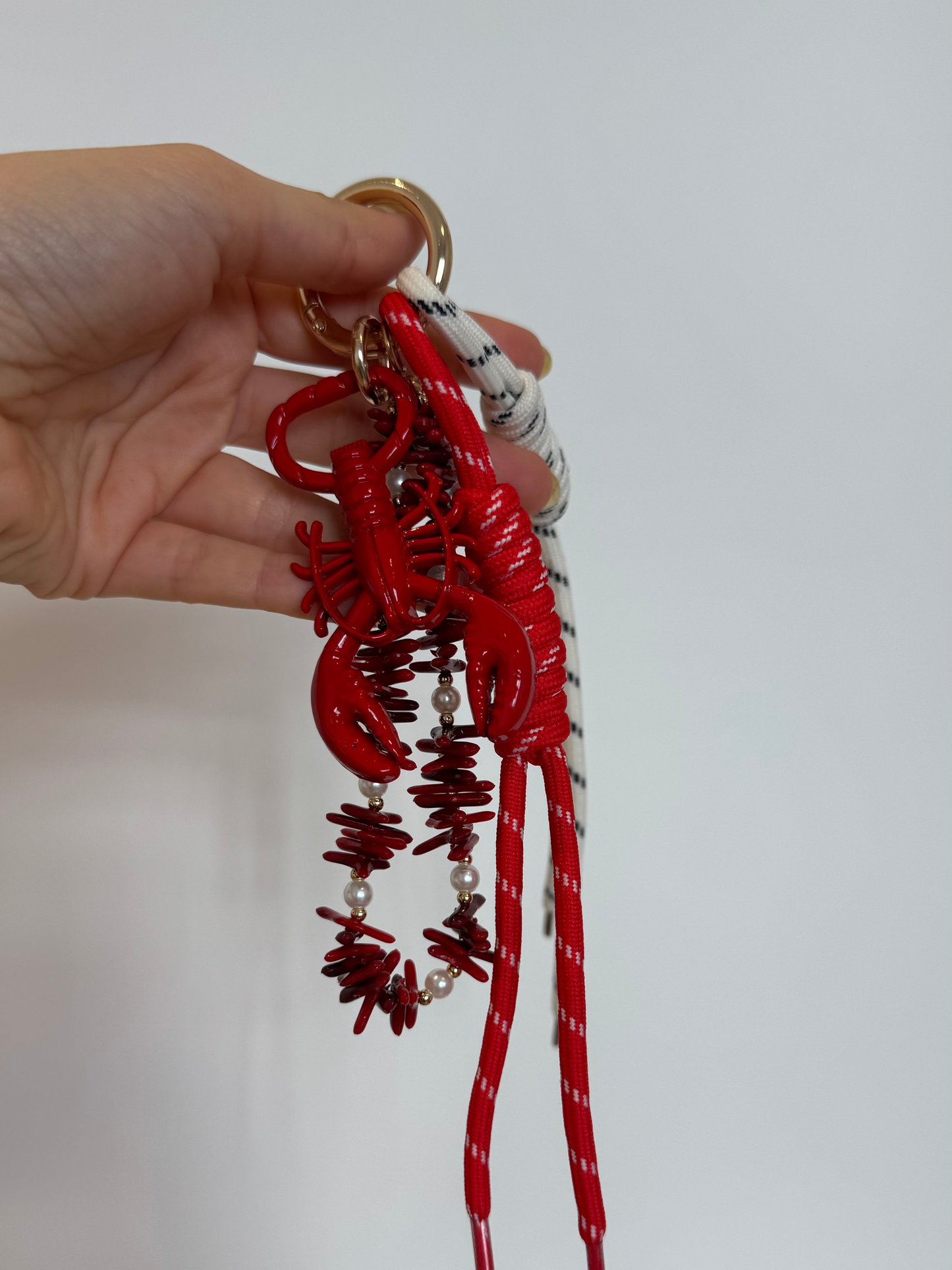Lagosta com pendente fio missangas